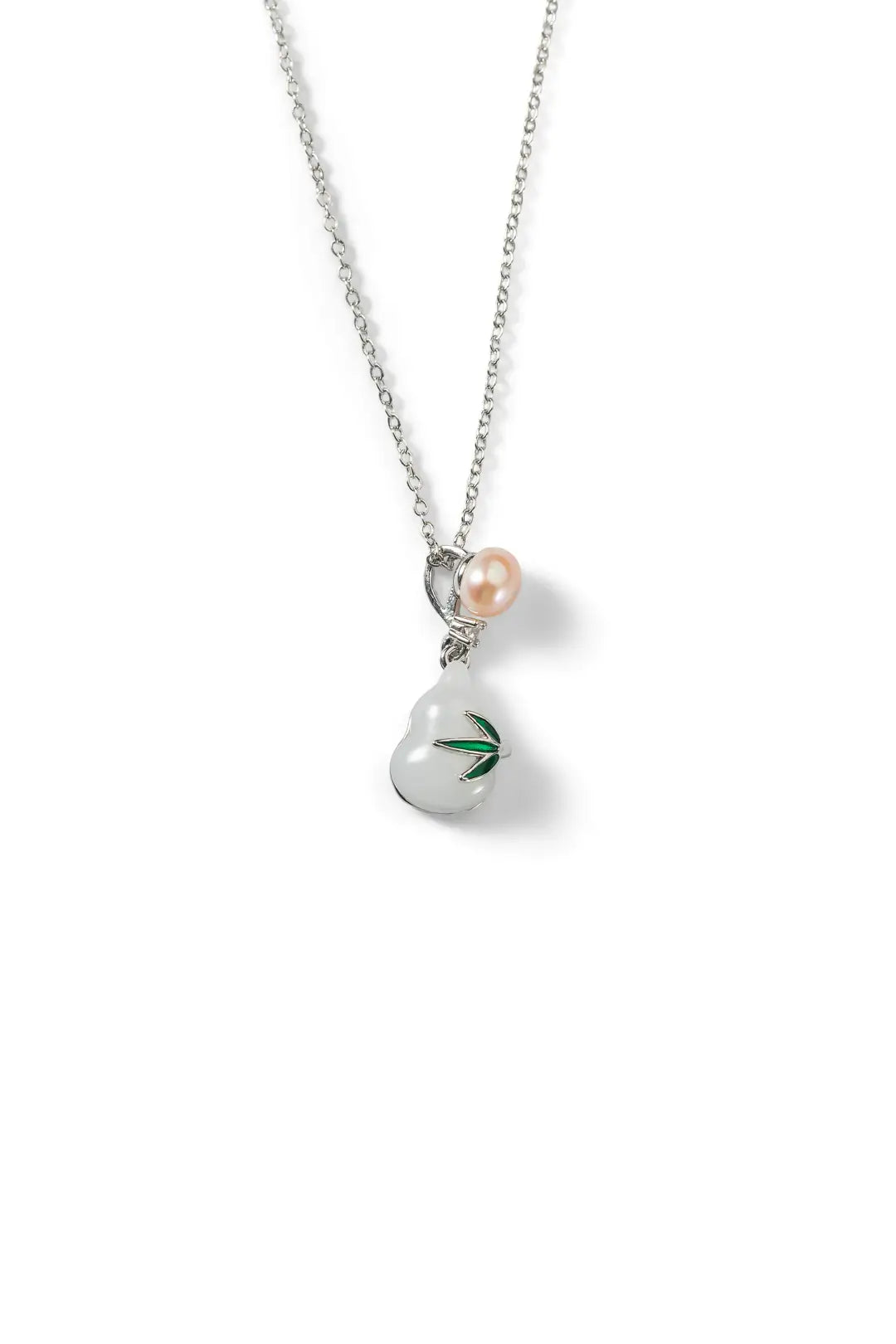 Aiko Tanaka Tsuyu no Kakera necklace hanging on a fine silver chain, a white gourd pendant topped with a peach pearl