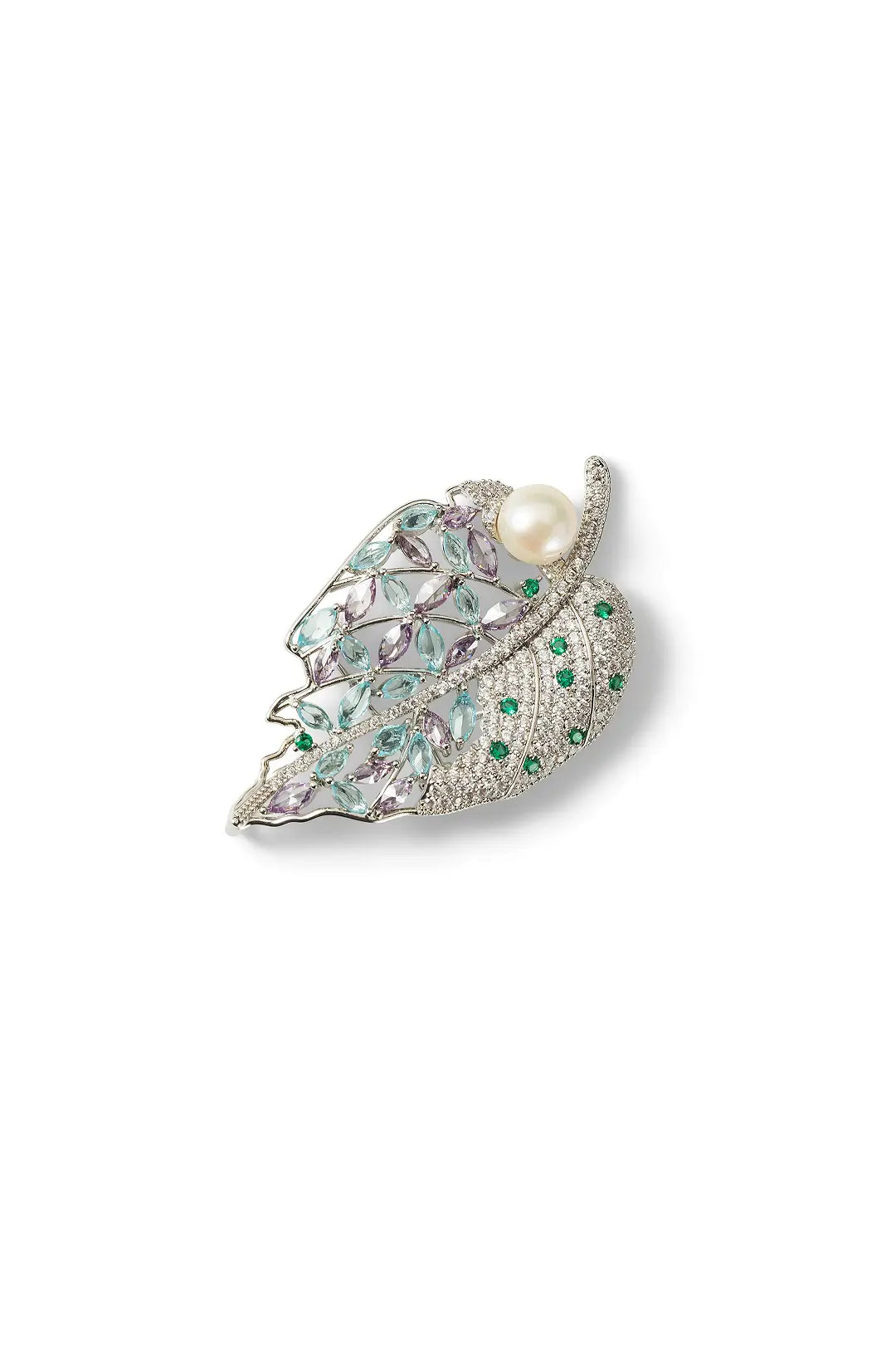 Aiko Tanaka Shion brooch, a silver pavé leaf set with green stones and a pearl, shown on a white background