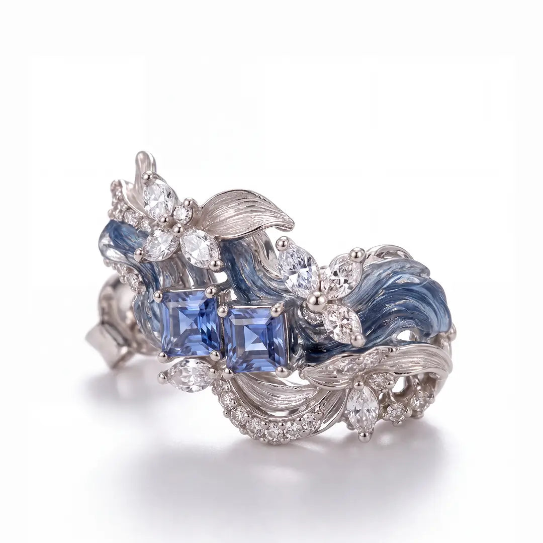 Aiko Tanaka High Jewelry No. 003 earrings side view, silver wave hoops with blue stones and crystal blooms