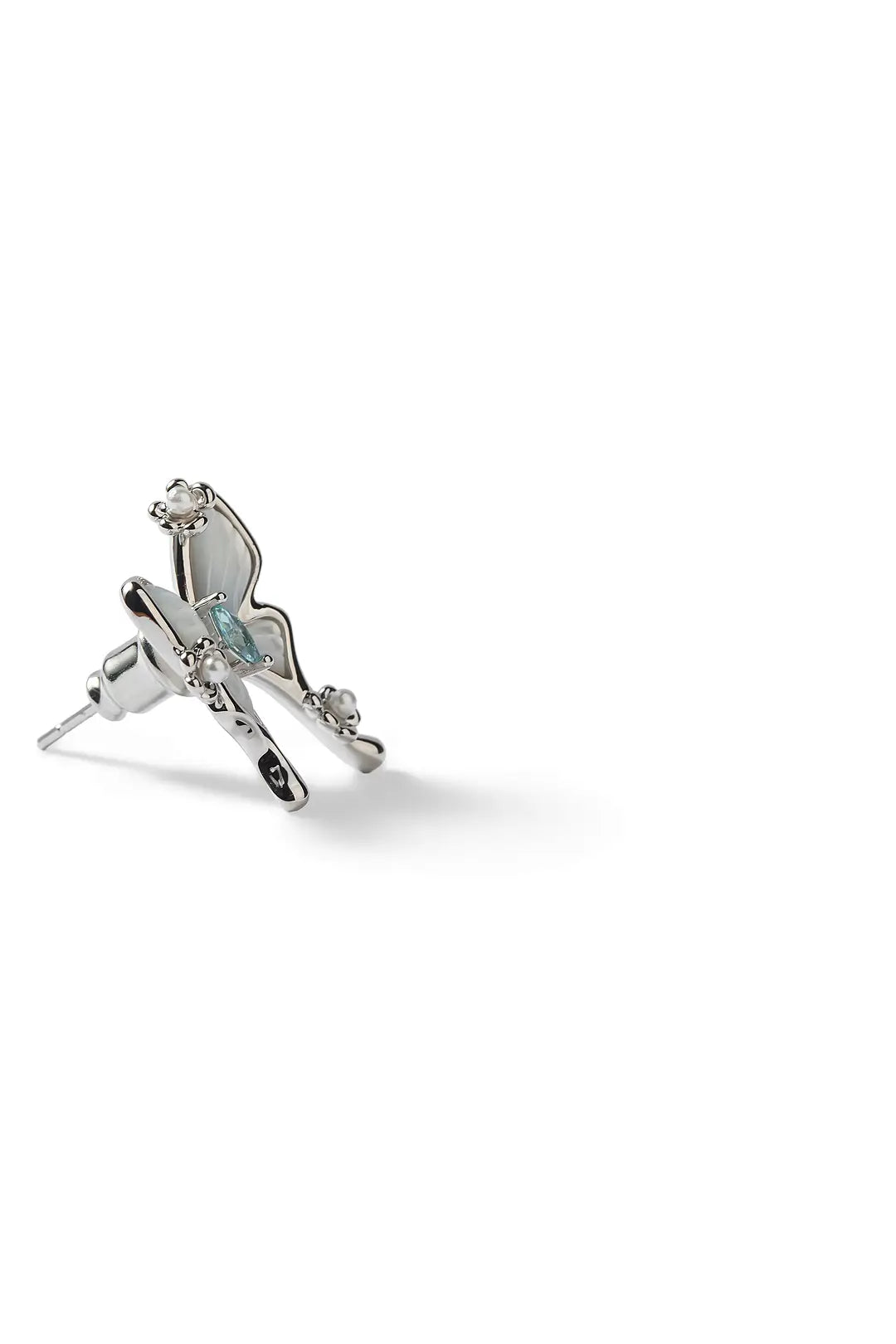Side view of an Aiko Tanaka Hakuyo butterfly earring with mother-of-pearl wings and silver crystals, on white