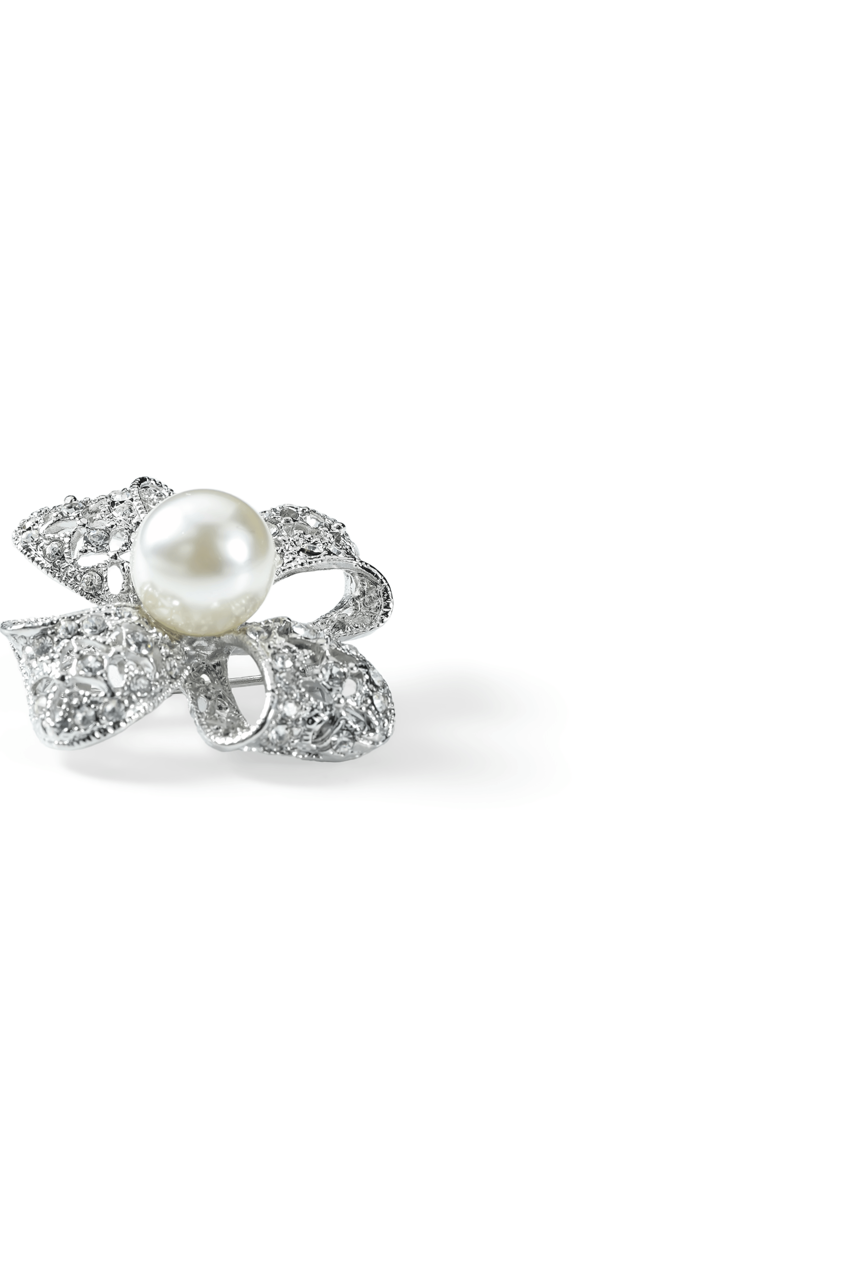 Side view of the Aiko Tanaka Hikari no Hana pearl flower brooch showing its openwork crystal petals in silver, on white