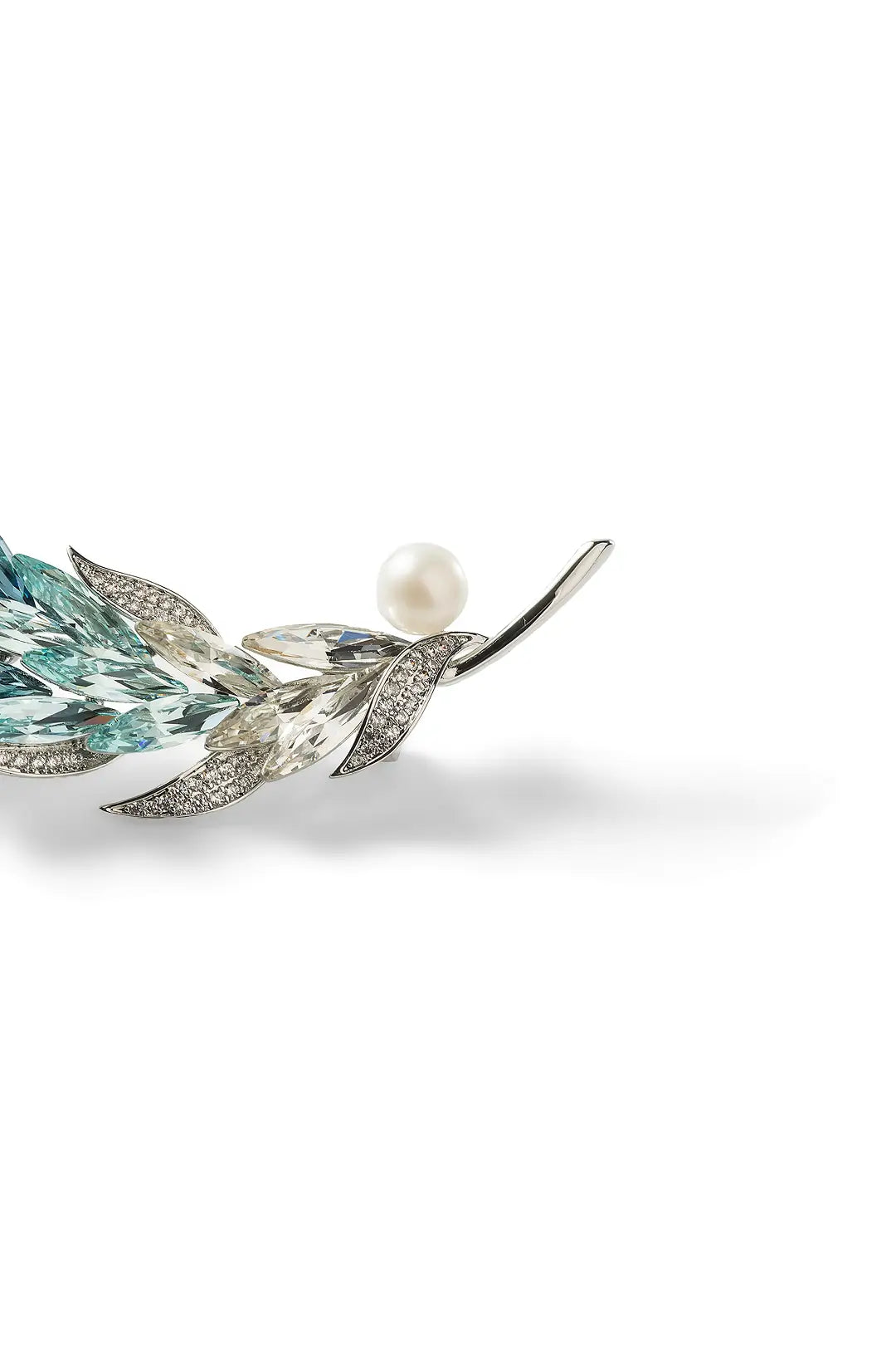 Aiko Tanaka Kazahana brooch side view, teal enamel feather fronds with a white pearl, on a white background