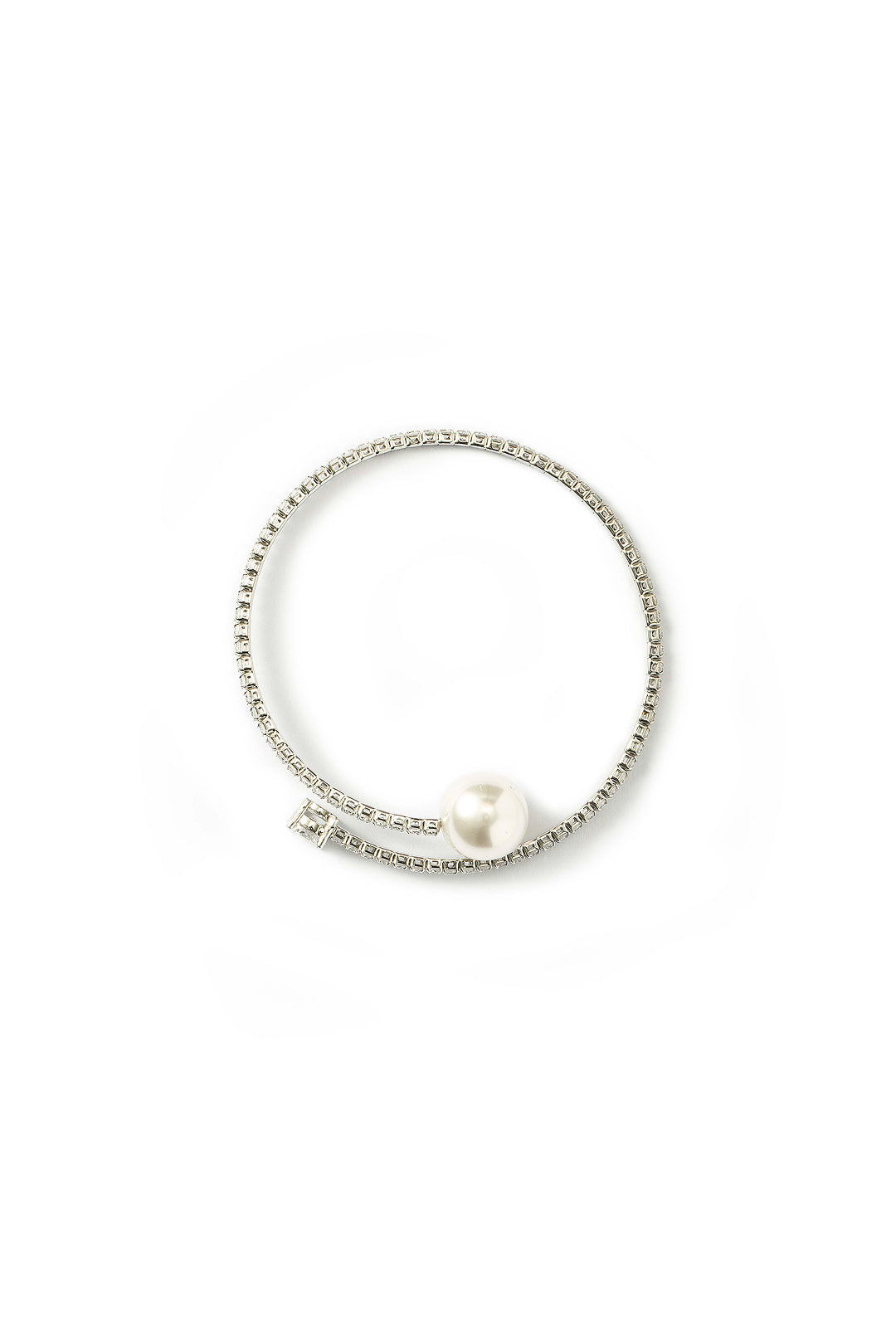 Aiko Tanaka Kinko no Wa silver wrap bangle lined with crystals and finished with a white pearl, shown flat on white