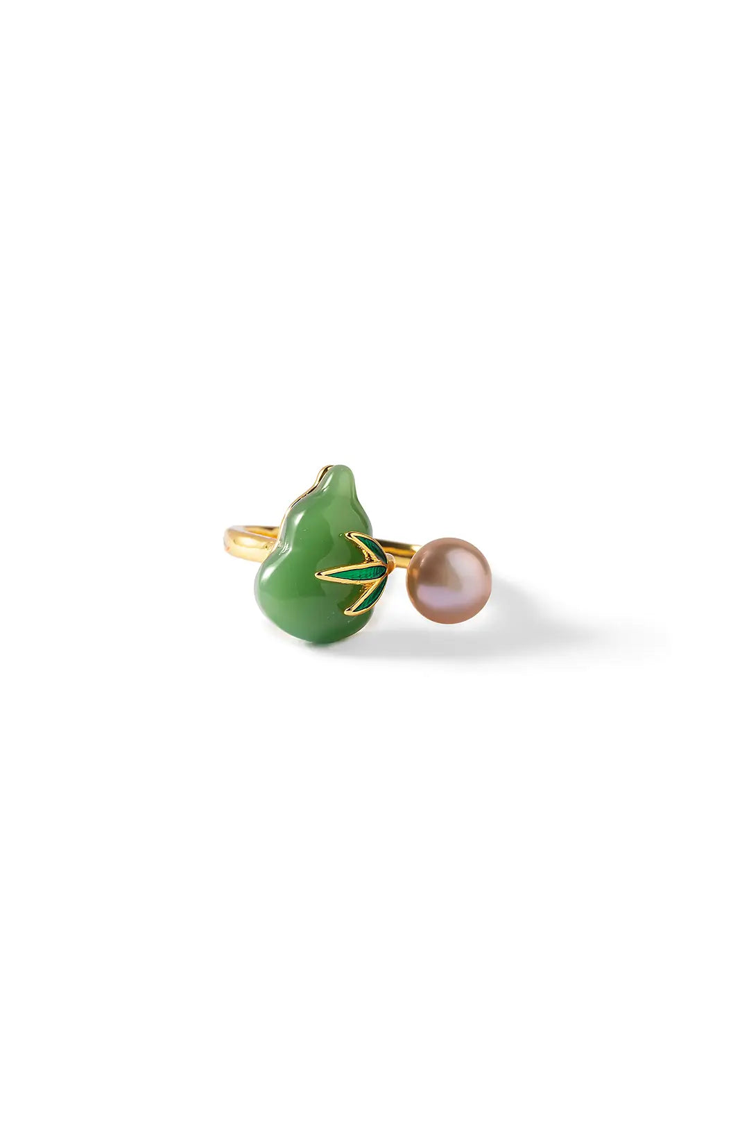 Aiko Tanaka Kissho ring, a carved green jade gourd and a pink pearl on an open gold band, on white