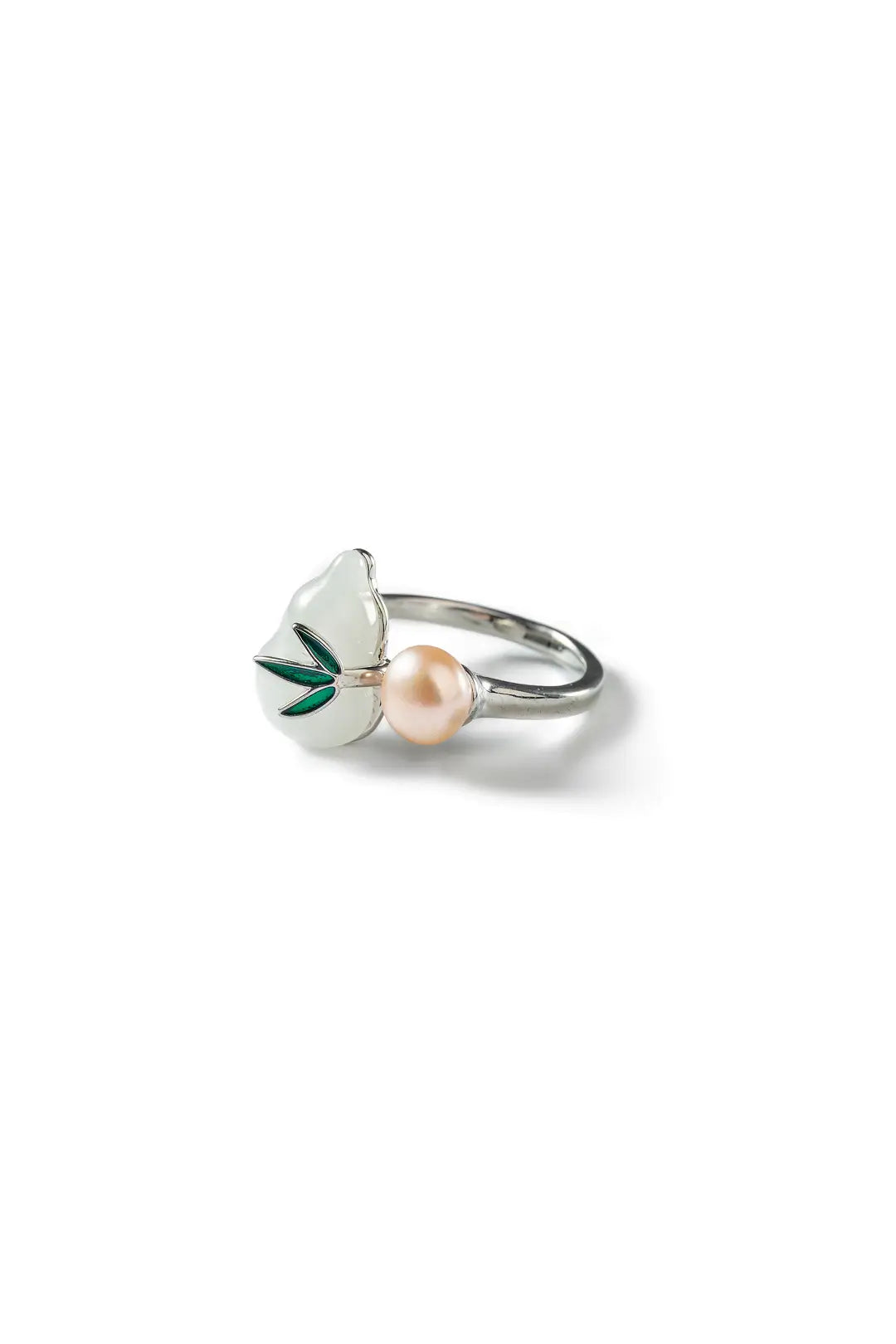 Aiko Tanaka Kissho ring, a silver open ring with a peach pearl and white gourd with green leaf, white background