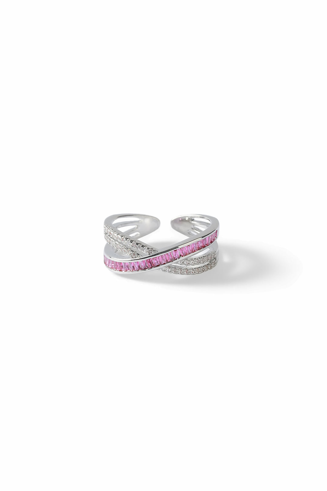 Aiko Tanaka Kosa ring with crossing silver bands of crystals and pink stones, small product shot on white