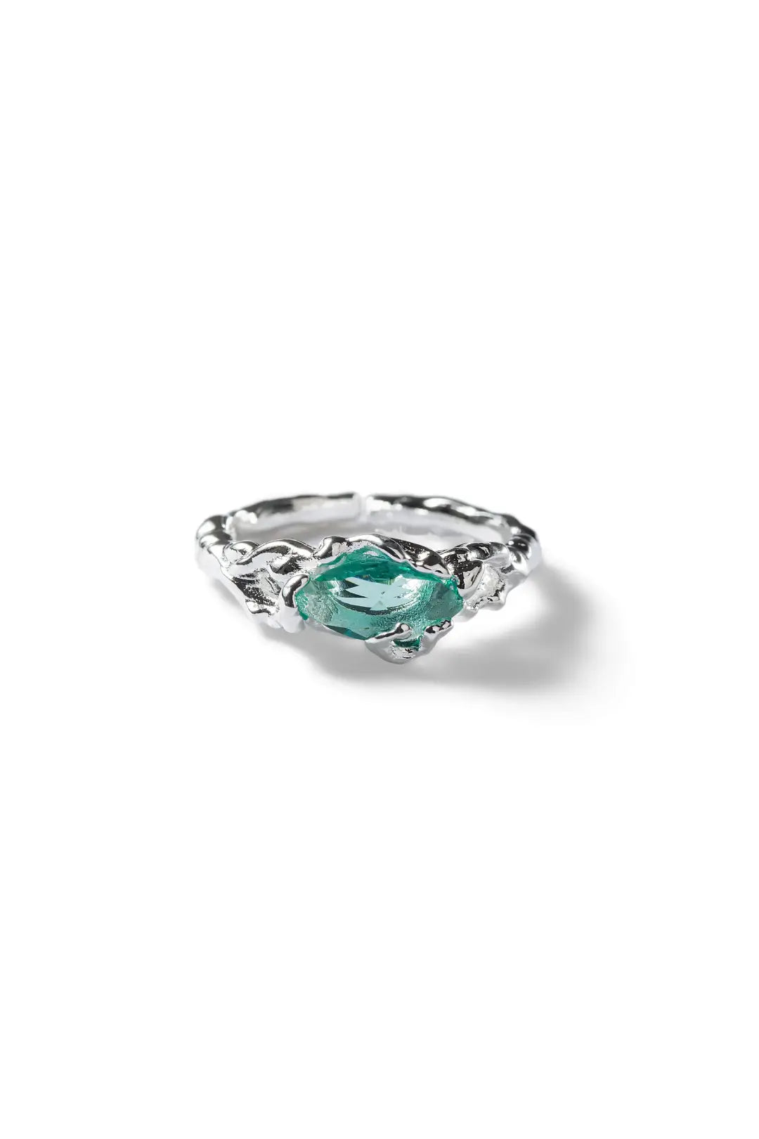 Aiko Tanaka Nami no Suisei ring angled view, a sculpted silver band with a teal marquise stone, white background