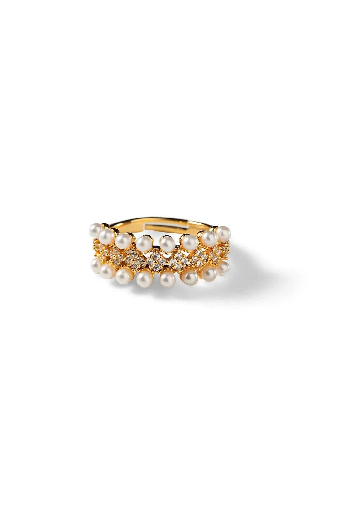 Aiko Tanaka Rinka ring, a gold band with layered rows of small white pearls, shown head-on on a white background