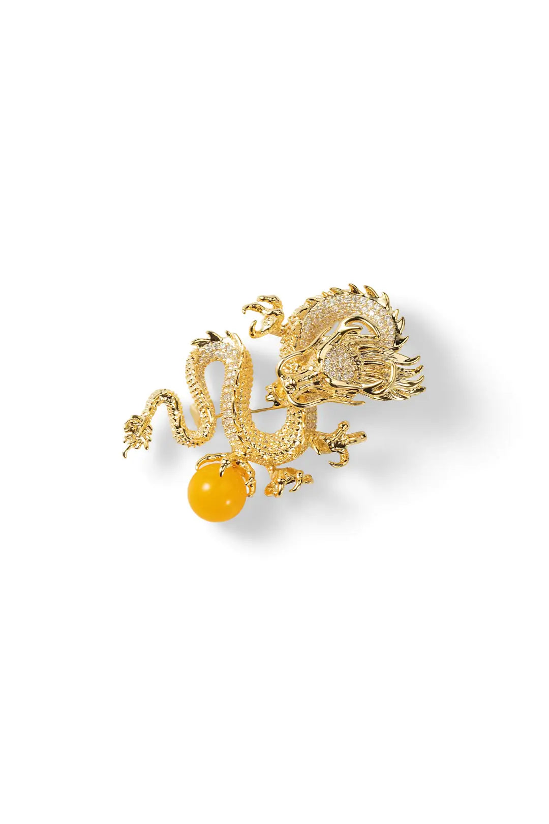 Aiko Tanaka Ryuko brooch, a gold crystal-set dragon clutching an amber orb, shown on a white background